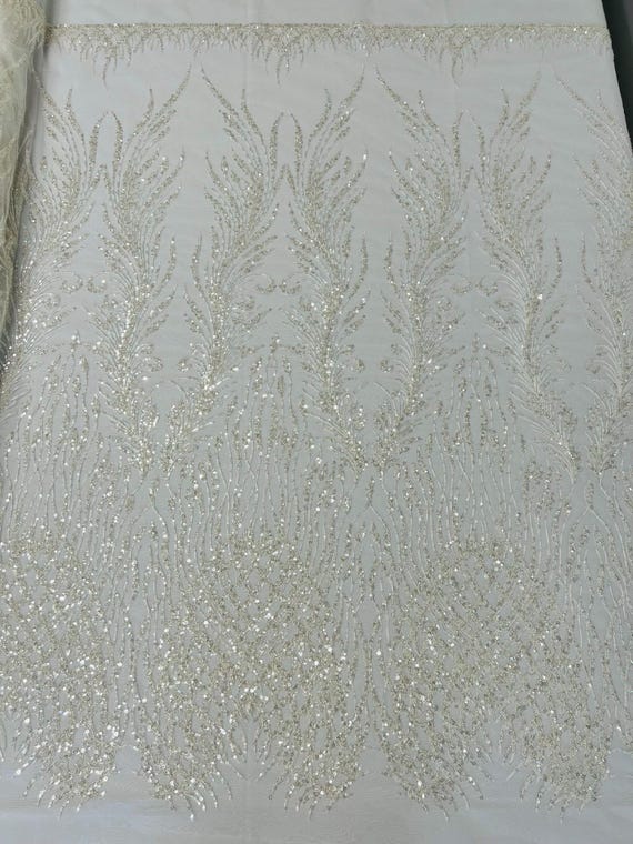 White Feathers damask embroider and heavy beaded on a mesh lace fabric- Sold by the yard