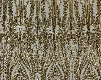Gold Damask design with sequins embroider on a 4 way stretch mesh fabric