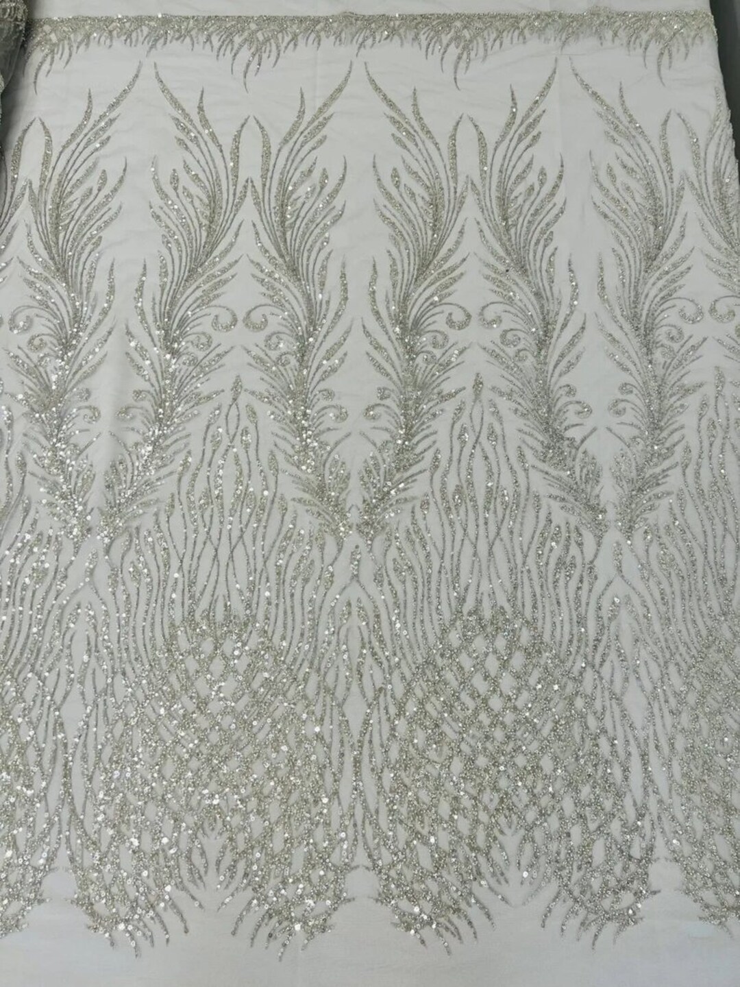 Royalty Fabrics Feathers hand beaded design embroider on a mesh lace-prom-sold by the yard. Silver main image 1
