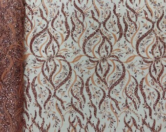 Silver Vine Design Embroider and heavy beading on a mesh lace-sold by the yard.