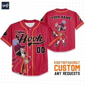 May include: Red baseball jersey with Captain Hook design. The jersey features a cartoon image of Captain Hook on the front and back, with the text "Captain Hook" and "00". The jersey has yellow stripes and the text "YOUR NAME" on the back.