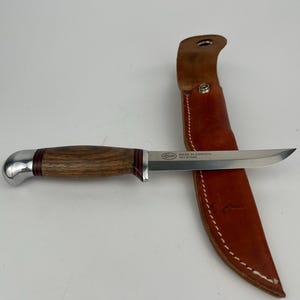 Frost&#39;s knife with leather sheath