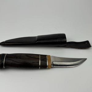 Hunting knife with horn and wooden handle vintage in leather sheath