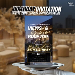 Peut inclure: Une invitation numérique noire et dorée pour une fête sur le toit célébrant un 34e anniversaire. L'invitation présente un arrière-plan de ville et le texte "Views & Vibes Rooftop Party" en lettres dorées. L'événement est prévu pour le vendredi 23 novembre, de 17h00 à 21h00. L'invitation comprend l'adresse et les informations RSVP.