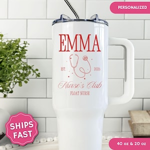 May include: White insulated tumbler with a handle, featuring the name "EMMA" in red, along with a stethoscope graphic and the text "Nurse's Club". The tumbler has a straw and a lid. The text "40 oz & 20 oz" is also visible.