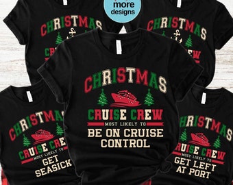 May include: Black Christmas t-shirts with festive designs. The shirts display the word "CHRISTMAS" in green and red, accompanied by cruise ship graphics and phrases such as "Cruise Crew" and "Most Likely To Be On Cruise Control."