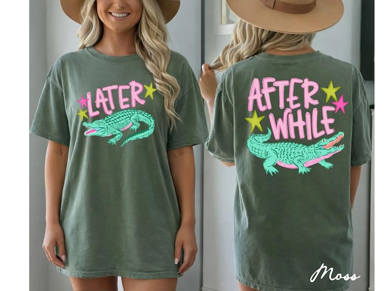 May include: Olive green t-shirt with a front graphic that says "LATER" above a teal alligator illustration. The back of the shirt says "AFTER WHILE" above a matching alligator graphic. Pink and yellow star accents are included.