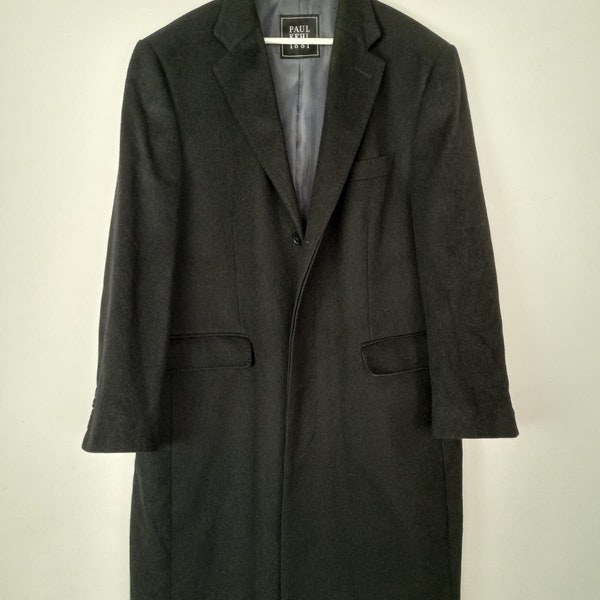 Pure cashmere black elegant coat fastened with buttons. Classic, timeless design.