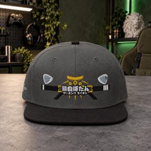Title Shishiro Botan Inspired Embroidered Snapback Hat – Charcoal & Black