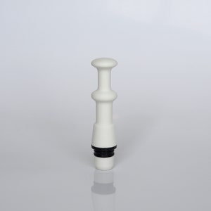 May include: White ceramic bottle stopper with a black rubber ring. The stopper has a rounded top and a cylindrical base.