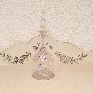 Small antique hand-painted glass carafe. Flowery enameled glass vial