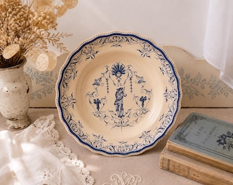 Moustiers faience plate, blue grotesque decor, signed F.d, late 19th century