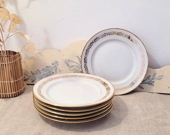 Servicio muy chic de 6 platos de postre de porcelana blanca. Platos elegantes con friso dorado sobre el marli.