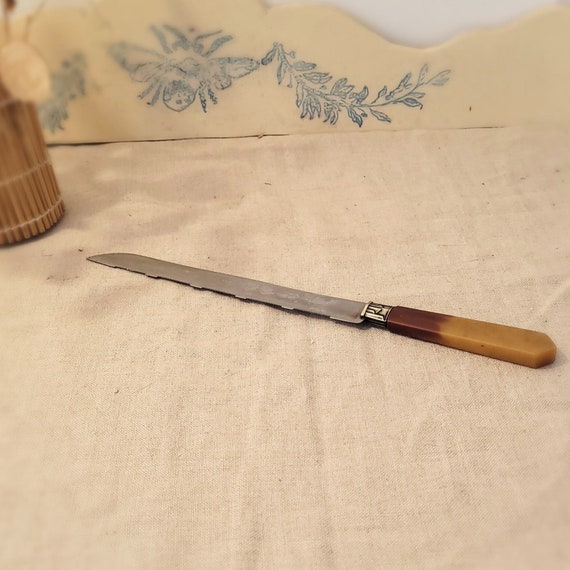 Couteau à pain Victorinox avec lame inox crantée 26 cm
