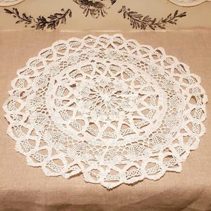 Vintage white lace doily. Old crochet doily