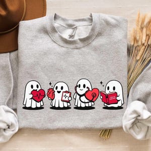 Halloween Nurse Sweatshirt, Ghost Cardiac Rehab CVICU ICU ER Nurse Shirt, Funny Cardiologist Cardiology Gift, Anatomical Heart Doctor Gifts