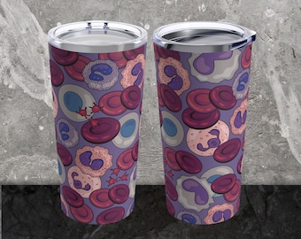 May include: Two stainless steel travel tumblers. The tumblers have a purple background and a pattern of red blood cells, white blood cells, and other biological elements. They have a silver rim and lid.