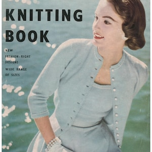 May include: Vintage Vogue Knitting Book cover featuring a woman in a light blue dress and cardigan. The cover text reads "VOGUE KNITTING BOOK" with additional text: "NEW FASHION-RIGHT DESIGNS WIDE RANGE OF SIZES". The cover also includes the text "NO 42 PRICE 2/6".