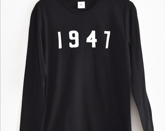 1947. Uniseks T-shirt met lange mouwen, gedragen door David Bowie. Organisch katoen. Handgemaakte zeefdruk.