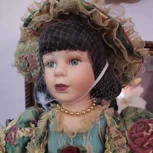 Sabrina Carrera Handmade Doll with Elegant Gown, Bonnet, and Drawstring Clutch
