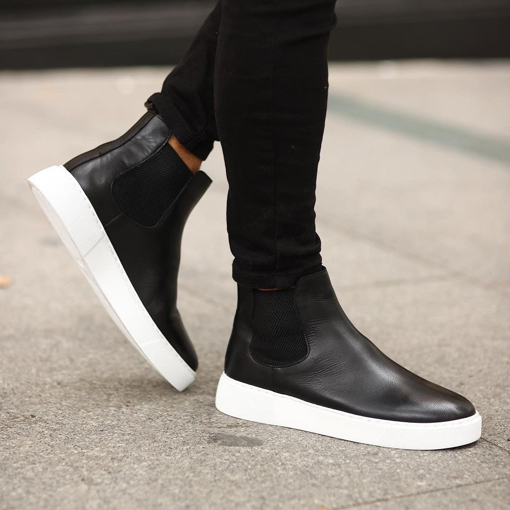 Black boots clearance with white soles