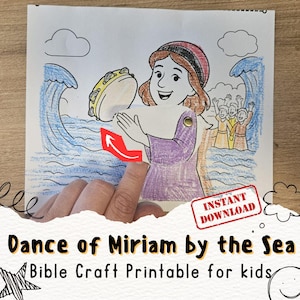 May include: A colorful illustration titled "Dance of Miriam by the Sea" with the text "Bible Craft Printable for kids." The image depicts a woman holding a tambourine, with waves and people in the background. A red arrow points to the tambourine.