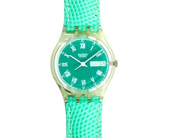 1993 Vintage Swatch Gent (GG704) "GREENSET", versión con correa de cuero, sin usar, en caja Swatch, con batería nueva