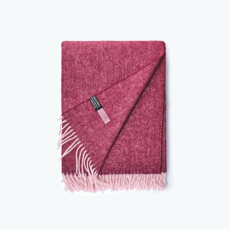 Wool Dark Red throw with light cream fringes  folded