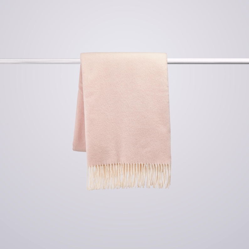 Soft pink cashmere and merino wool blanket with fringe