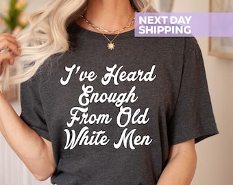 May include: A dark gray t-shirt with white text that reads "I've Heard Enough From Old White Men".
