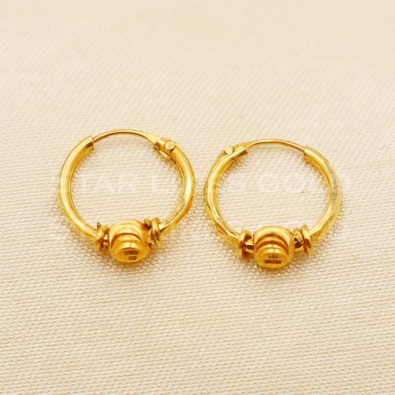 Gold bali hoop earrings best sale