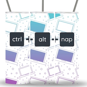 May include: Three white insulated tumblers with silver straws. The tumblers feature a repeating pattern of laptop computers in shades of blue and purple. The text "ctrl + alt + nap" is displayed on the front of each tumbler in a black box.
