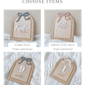 May include: Four arched wooden signs with striped borders and decorative bows. Top left: Keaton Mateo name sign. Top right: Hallie Blair birth stat sign with lines for date, time, weight, and length. Bottom: Two reversible milestone signs showing 9 and 1.