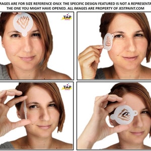 May include: Four images showing a woman holding a stencil in front of her face. The stencil is a simple design of a geometric shape. The images show the stencil being held in different positions in front of the face.