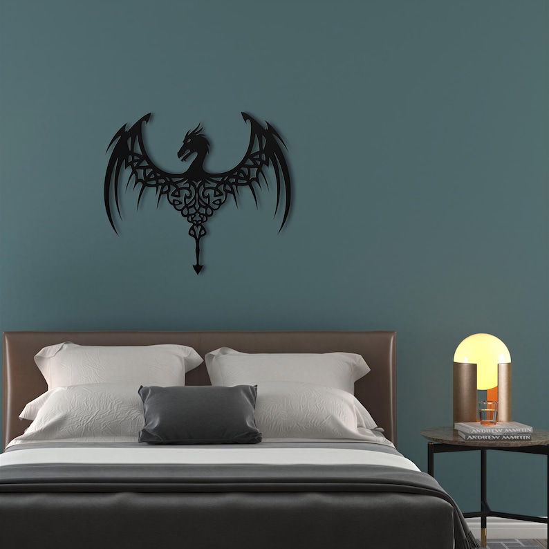 a bedroom with a bed, a nightstand, and a wall art depicting a dragon.