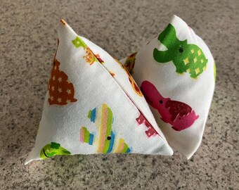 Pair of cotton, pyramid-shaped catnip toys in white with colorful hippos pattern, organic catnip, for cats and kittens, cat gifts