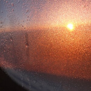 Arctic Sunset through Airplane Window