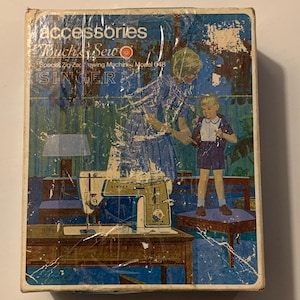 May include: Vintage Singer Touch & Sew accessories box. The box features a colorful illustration of a sewing machine, a woman, and a child. Text on the box reads "accessories", "Touch & Sew", "Special Zig-Zag Sewing Machine", and "SINGER".