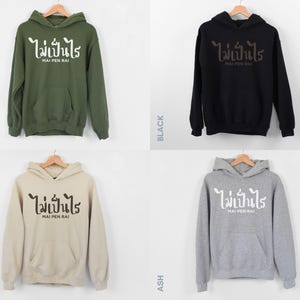 Mai Pen Rai Hoodie Thai Language Text Meaning Its Okay Thailand Travel Souvenir Vacation Memory Apparel Gift Comfortable Warm Cotton Polyester Blend Plush Soft Design Cultural Expression Bangkok Thailand Memento Perfect Present Special Gift