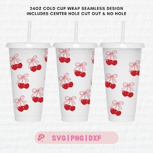 May include: Three white 24oz cold cups with red cherries and white bows printed on them. The cups are shown with straws. The text "24OZ COLD CUP WRAP SEAMLESS DESIGN INCLUDES CENTER HOLE CUT OUT & NO HOLE" is at the top of the image. The text "SVG PNG | DXF" is at the bottom of the image.
