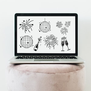 May include: A laptop computer with a white background displaying black and white illustrations of fireworks, champagne glasses, and disco balls.