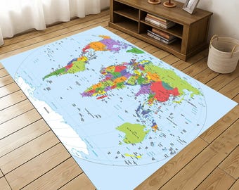 May include: A rectangular area rug featuring a detailed world map design. The rug displays continents in various colors against a light blue background, with country borders and ocean names clearly marked. The rug is placed on a wooden floor.