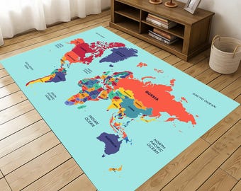 May include: A rectangular area rug featuring a colorful world map design. The rug has a light blue background with continents in various colors, including red, blue, and yellow. The rug is placed on a wooden floor.