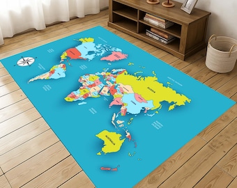 May include: A large, rectangular area rug featuring a colorful world map design. The rug has a bright blue background with continents in various colors. A compass rose is in the upper left corner. The rug is placed on a wooden floor.