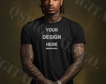May include: A black t-shirt with the text "YOUR DESIGN HERE" and "QSDIGITALSCO." printed in white on the front.