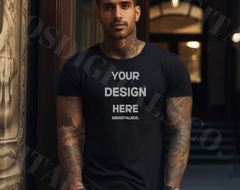 May include: A black t-shirt with the text "YOUR DESIGN HERE" and the website "QSDIGITALSCO.COM" printed on the front.