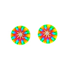 May include: A pair of colorful round earrings with a rainbow swirl pattern. The earrings are made of glass and have a shiny finish.