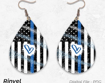 May include: A pair of teardrop-shaped earrings featuring a blue and white American flag design with a blue heart. The earrings have a distressed look and are made of metal.