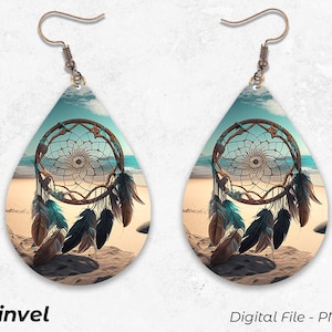 May include: A pair of teardrop-shaped earrings with a beach scene and a dreamcatcher with feathers. The earrings are made of metal and have a brown finish.
