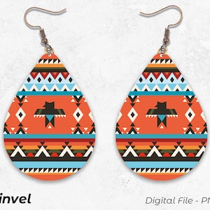 May include: A pair of teardrop-shaped earrings with a geometric pattern in shades of orange, red, blue, black, and white. The earrings feature a stylized bird design in the center.